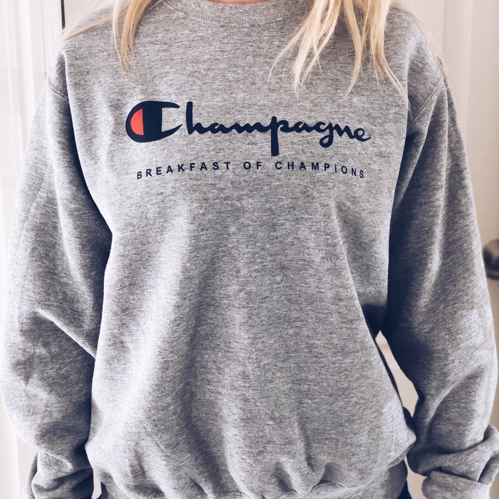 Champagne breakfast of champions sweatshirt.